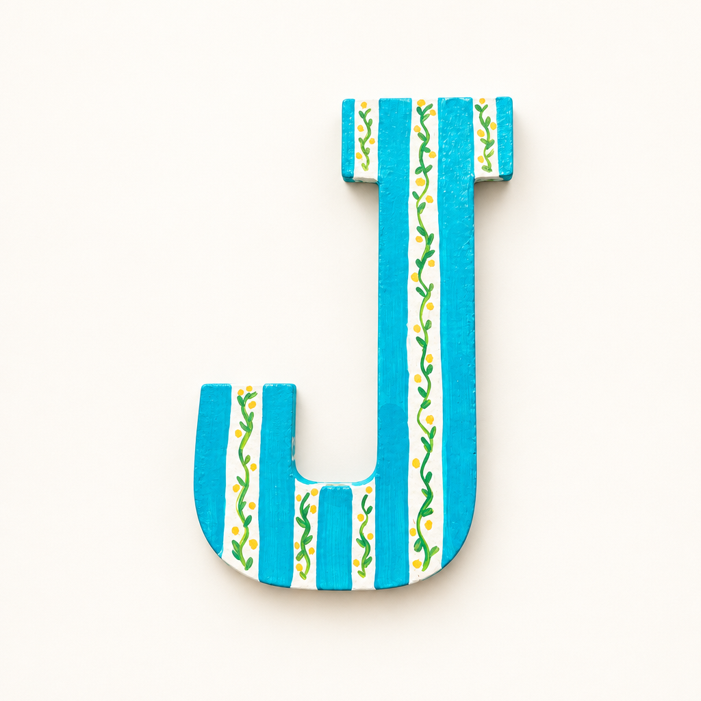 Handpainted J with a warm-white background