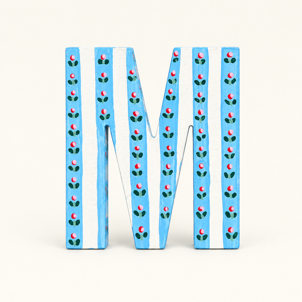 Handpainted M with a warm-white background